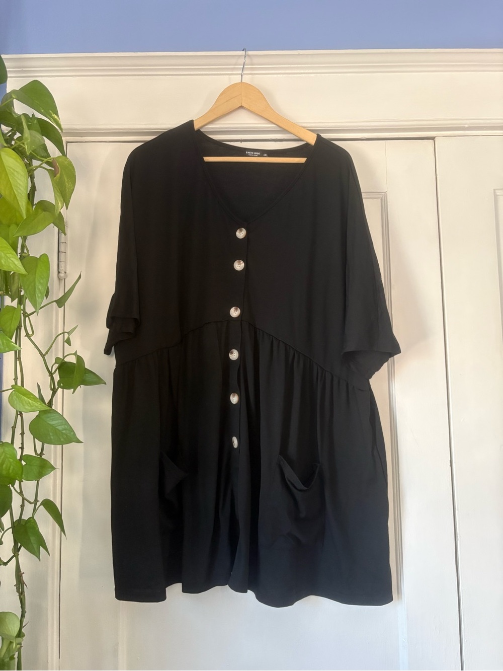 Black Button-Front Women’s Peplum Top with Pockets